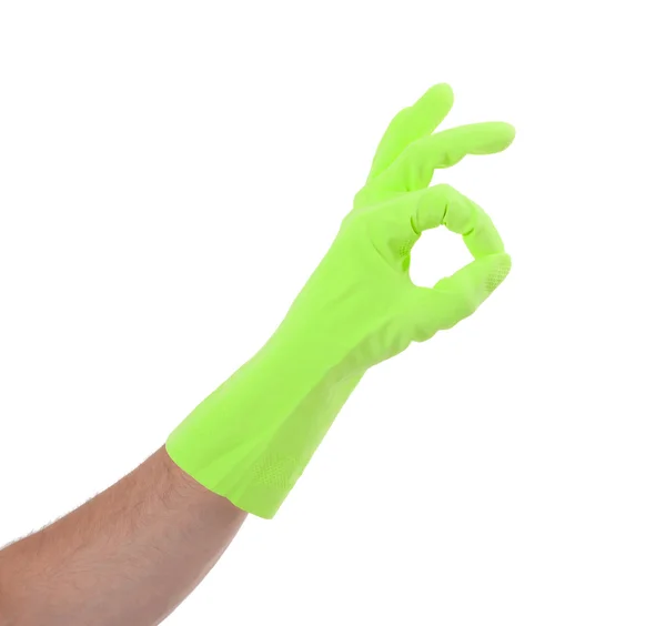 Hand gesturing with green cleaning product glove — Stock Photo, Image