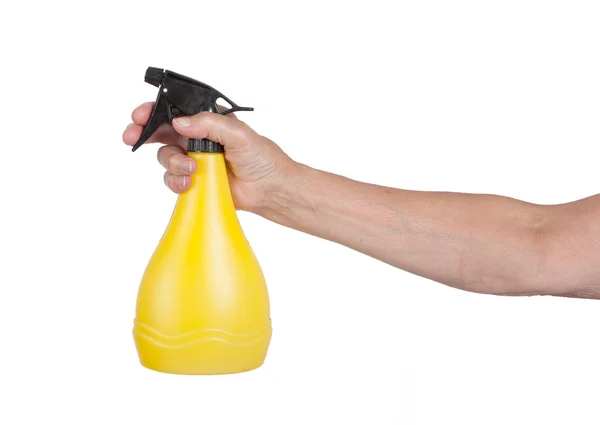 Sprayer in the hand of an old woman — Stock Photo, Image