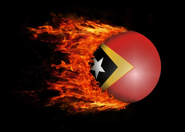 Flaga z szlak ognia - Timor Wschodni — Zdjęcie stockowe