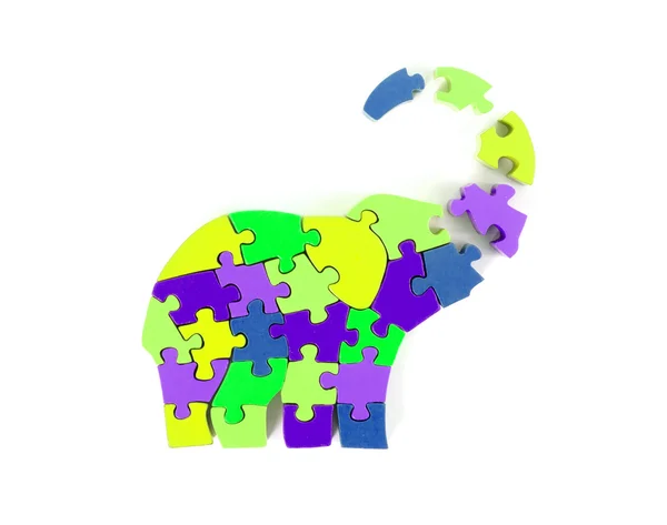 Colorful puzzle pieces in elephant shape — Stock Photo, Image