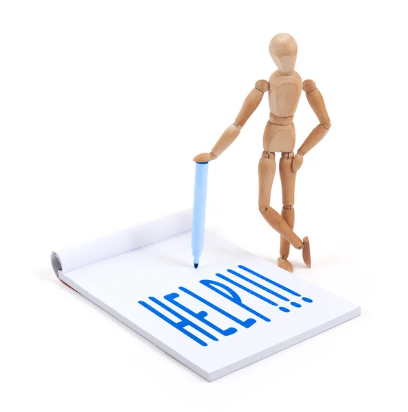 Wooden mannequin writing - Help — Stock Photo, Image