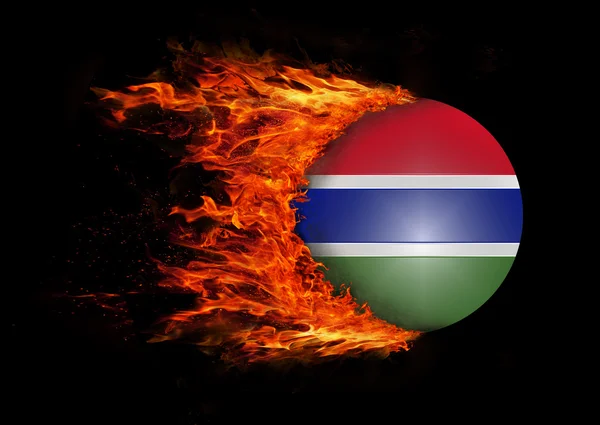 Flagge mit einer Spur des Feuers - Gambia — Stockfoto