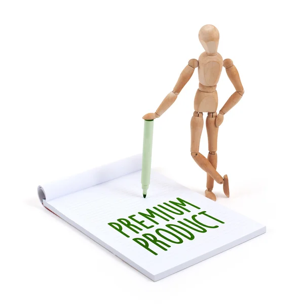 Wooden mannequin writing - Premium product — Stock Photo, Image