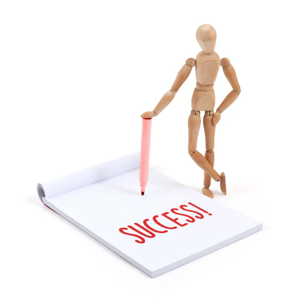 Wooden mannequin writing - Success — Stock Photo, Image