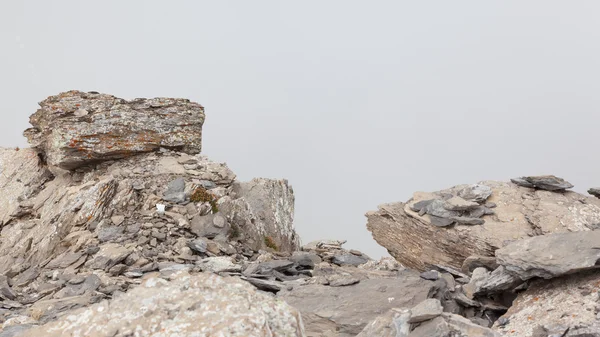 Large boulders in fog — Stock Photo, Image