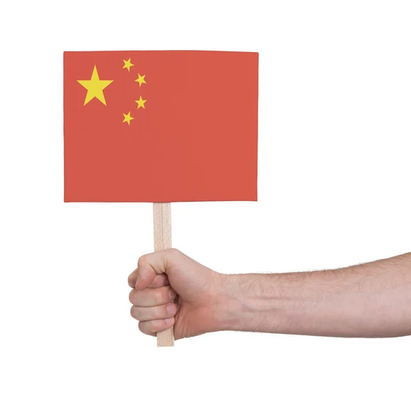 Hand holding small card - Flag of China — Stock Photo, Image