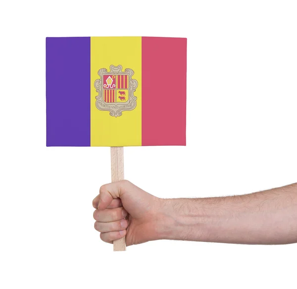 Hand som håller litet kort - flagga Andorra — Stockfoto