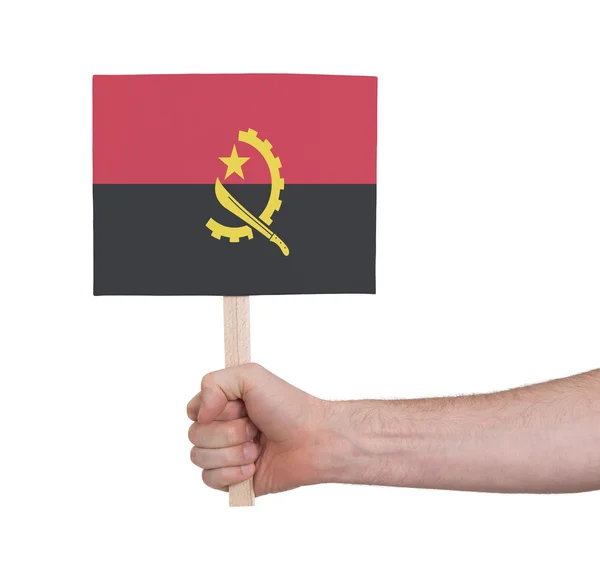 Main tenant une petite carte - Drapeau de l'Angola — Photo