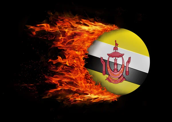 Flagga med ett spår av eld - Brunei — Stockfoto