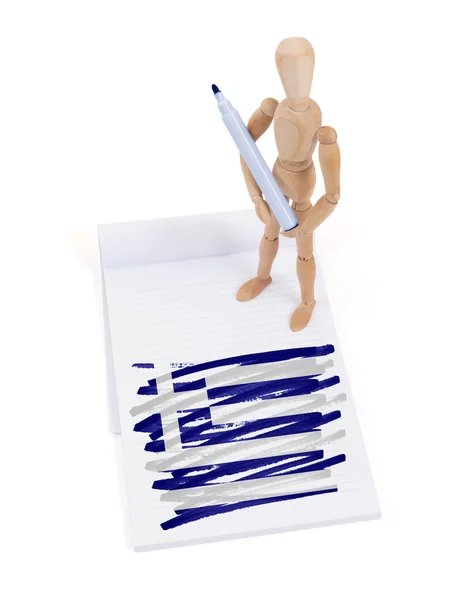 Wooden mannequin made a drawing - Greece Stock Photo
