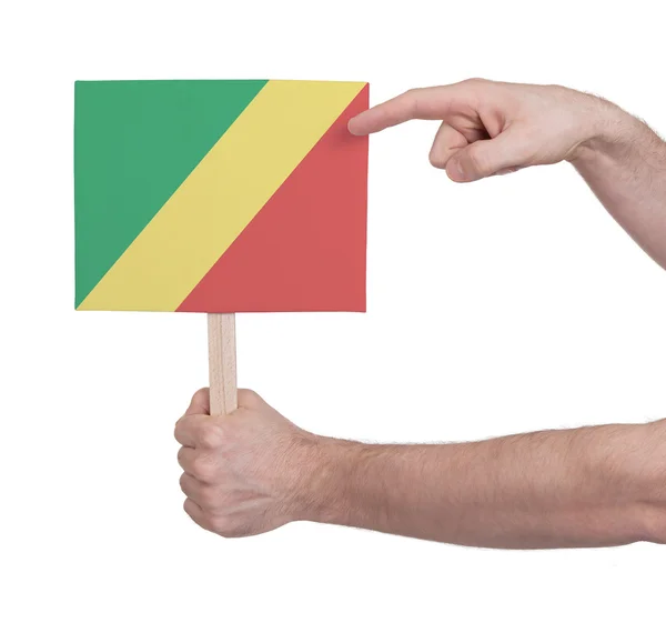 Hand hält kleine Karte - Flagge des Kongo — Stockfoto