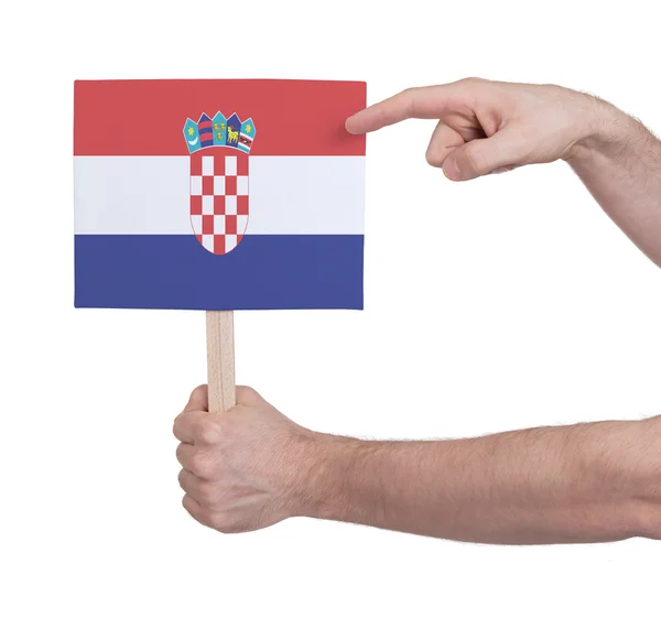 Hand hält kleine Karte - Fahne von Kroatien — Stockfoto