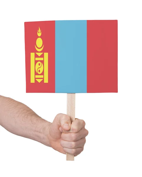 Hand hält kleine Karte - Flagge der Mongolei — Stockfoto