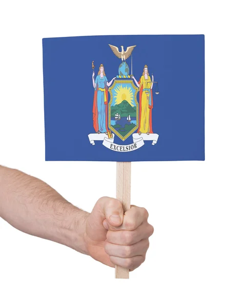 Hand holding small card - Flag of New York — Stock Photo, Image