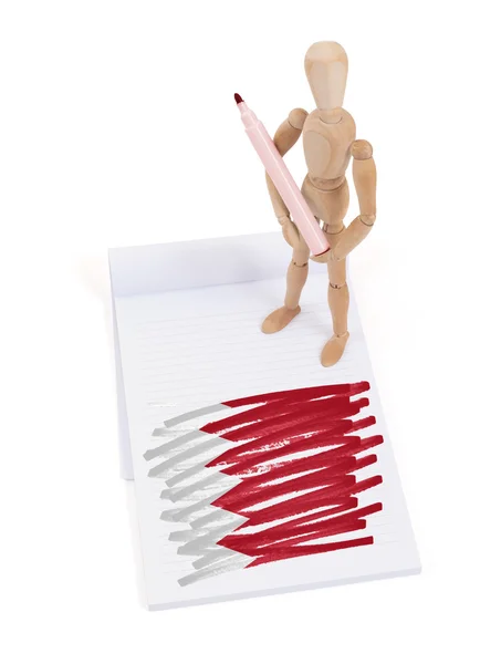 Wooden mannequin made a drawing - Bahrain Stock Image
