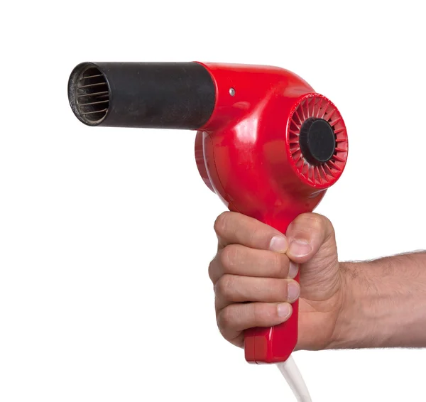 Elinde eski kırmızı saç kurutma makinesi — Stok fotoğraf