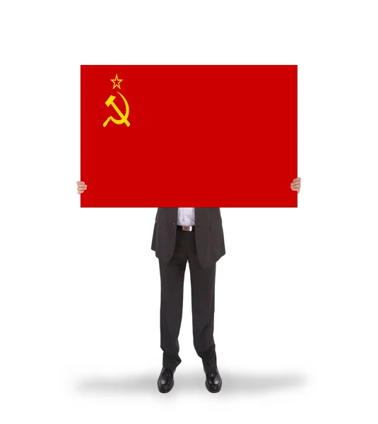 Leende affärsman håller ett stort kort, flaggan av USSREN — Stockfoto