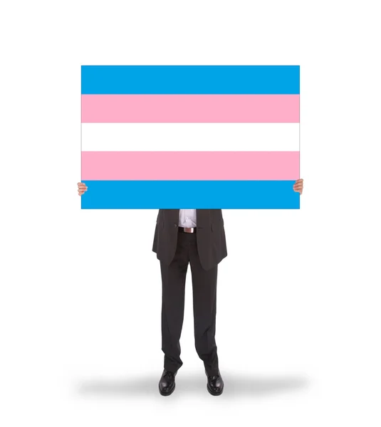 Homme d'affaires souriant tenant une grande carte, drapeau de Trans Pride — Photo