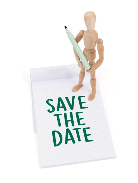 Wooden mannequin writing - Save the date — Stock Photo, Image