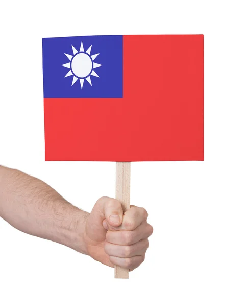 Hand holding small card - Flag of Taiwan — Stock Photo, Image