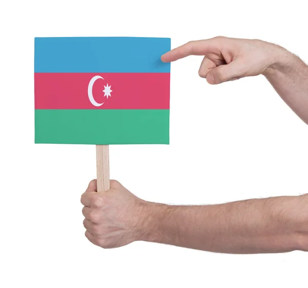 Mano che tiene piccola carta - Bandiera dell'Azerbaigian — Foto Stock