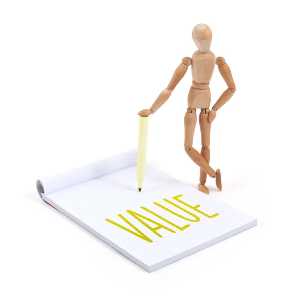 Wooden mannequin writing - Value — Stock Photo, Image