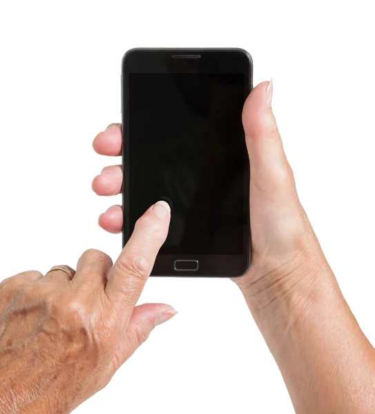Mujer mayor mano con teléfono inteligente aislado — Foto de Stock