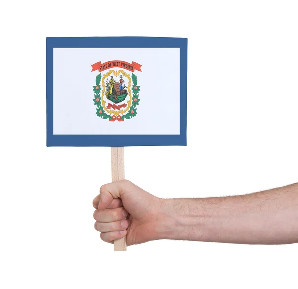 Hand holding small card - Flag of West Virginia — Stock Photo, Image