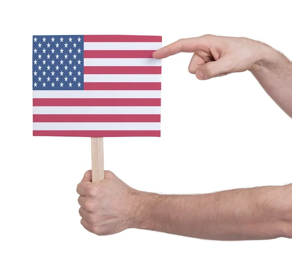 Hand holding small card - Flag of the USA — Stock Photo, Image