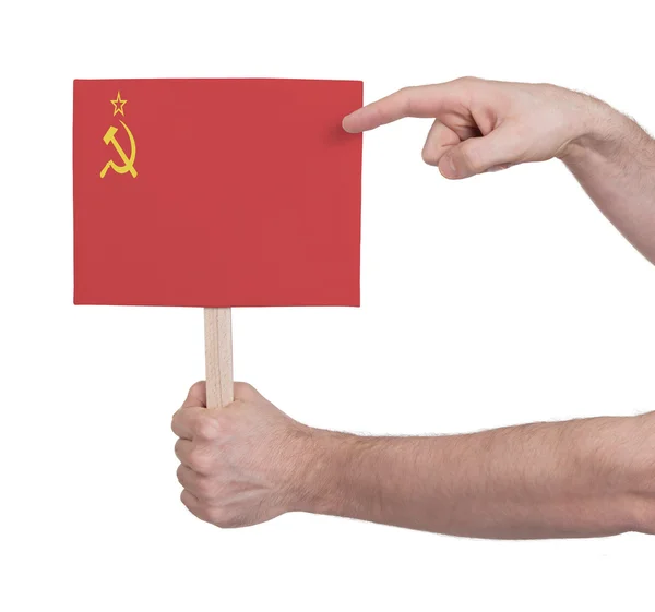 Mão segurando pequeno cartão - Bandeira da URSS — Fotografia de Stock