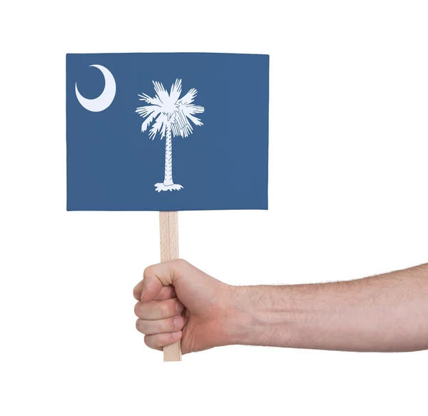 Hand holding small card - Flag of Oklahoma — Stock Photo, Image