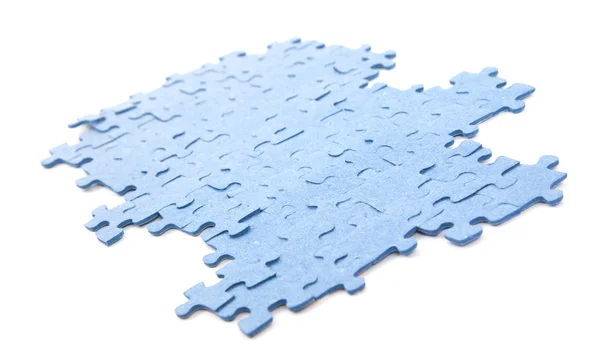 Collegato pezzi di puzzle blu isolati — Foto Stock