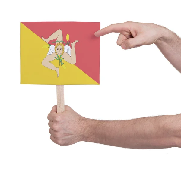 Ręka gospodarstwa małe karty - flaga Sycylii — Zdjęcie stockowe