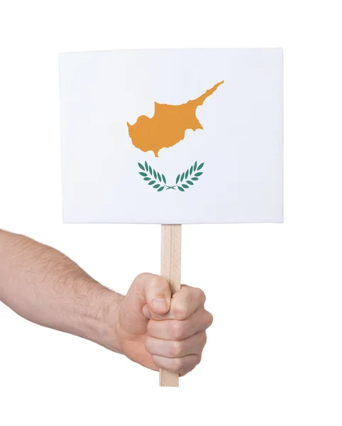 Hand hält kleine Karte - Flagge Zyperns — Stockfoto