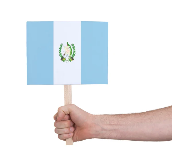 Ręka gospodarstwa małe karty - flaga Gwatemali — Zdjęcie stockowe
