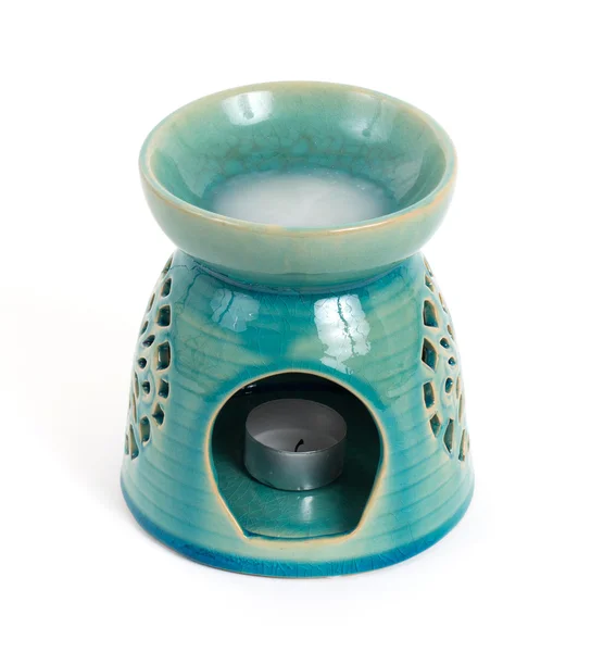 Candle in oil burner — Stock Photo, Image