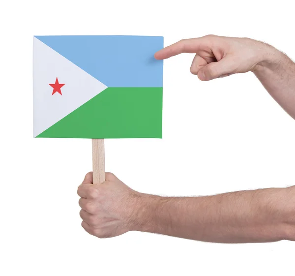 Main tenant une petite carte - Drapeau de Djibouti — Photo