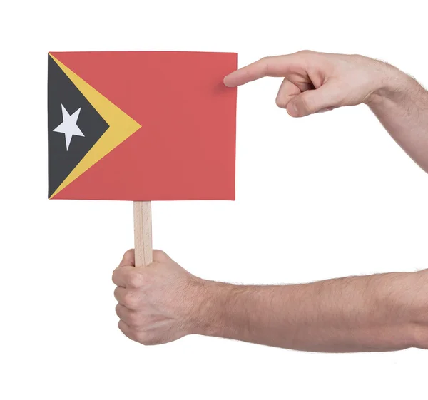 Pequeno cartão de mão - Bandeira de Timor-Leste — Fotografia de Stock