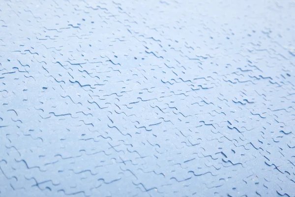 З'єднані сині шматочки головоломки ізольовані — стокове фото