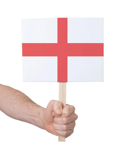 Mano sosteniendo tarjeta pequeña - Bandera de Inglaterra — Foto de Stock