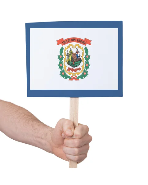 Mão segurando cartão pequeno - Bandeira da Virgínia Ocidental — Fotografia de Stock