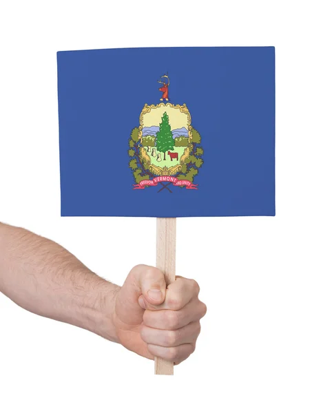 Kädessä pieni kortti - Vermontin lippu — kuvapankkivalokuva