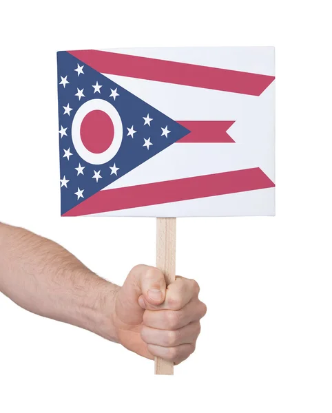 Hand holding small card - Flag of Ohio — Stock Photo, Image