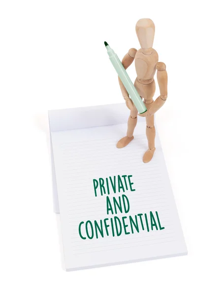 Wooden mannequin writing - Private and confidential — Stock Photo, Image