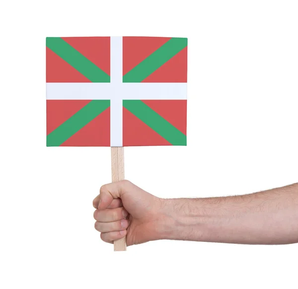 小さなカード - バスク国の旗を持っている手 — ストック写真
