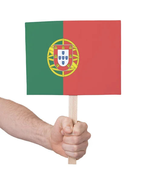 Hand hält kleine Karte - Flagge Portugals — Stockfoto