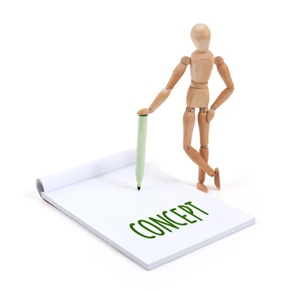 Wooden mannequin writing - Concept — Stock Photo, Image