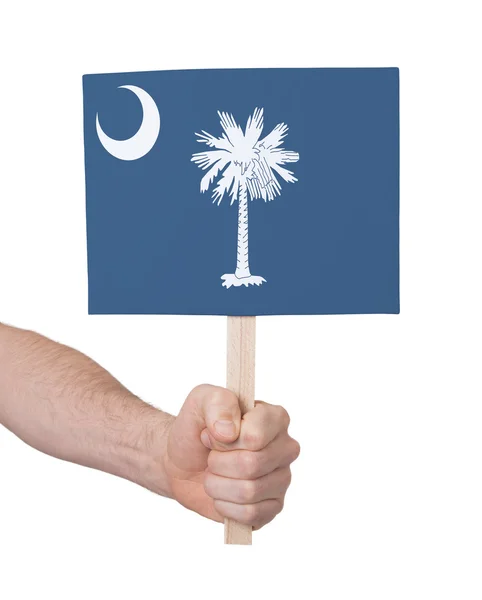 Hand holding small card - Flag of Oklahoma — Stock Photo, Image