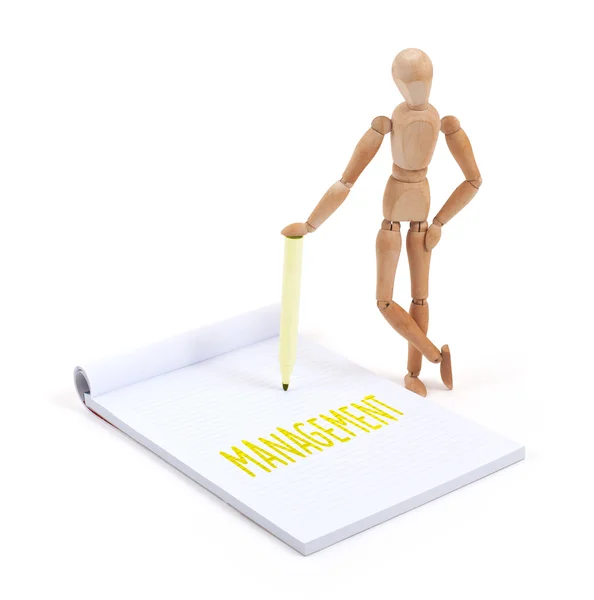 Wooden mannequin writing - Management — Stock Photo, Image