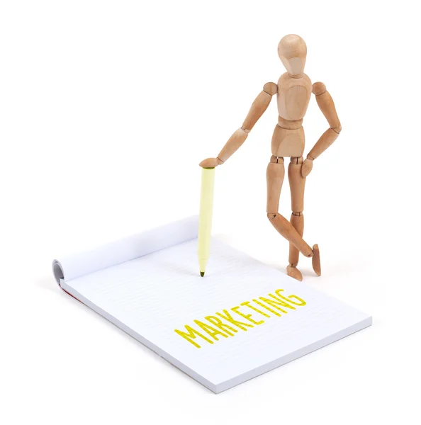 Wooden mannequin writing - Marketing — Stock Photo, Image